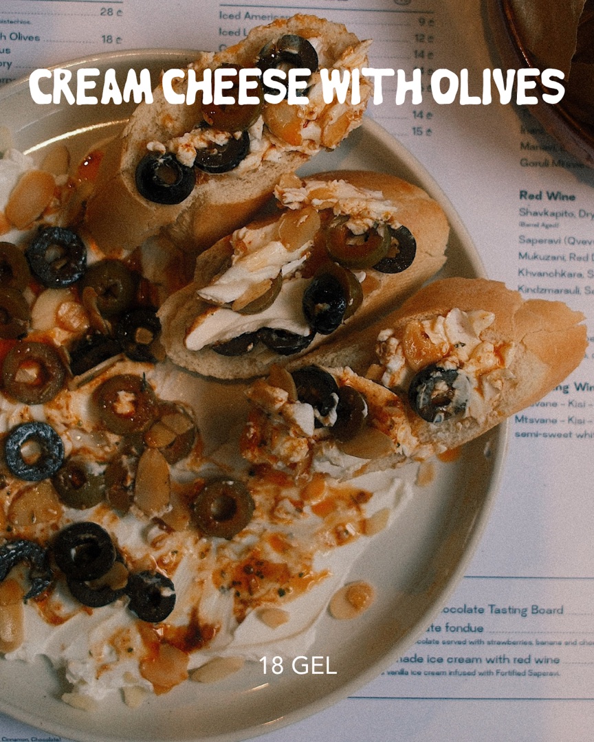 Cream cheese with olives on toast