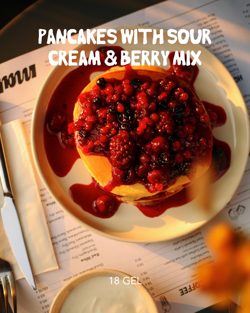 Pancakes with sour cream and berry mix