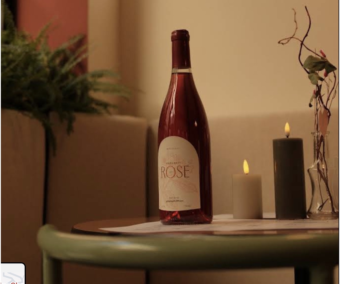 Bottle of rosé by candlelight